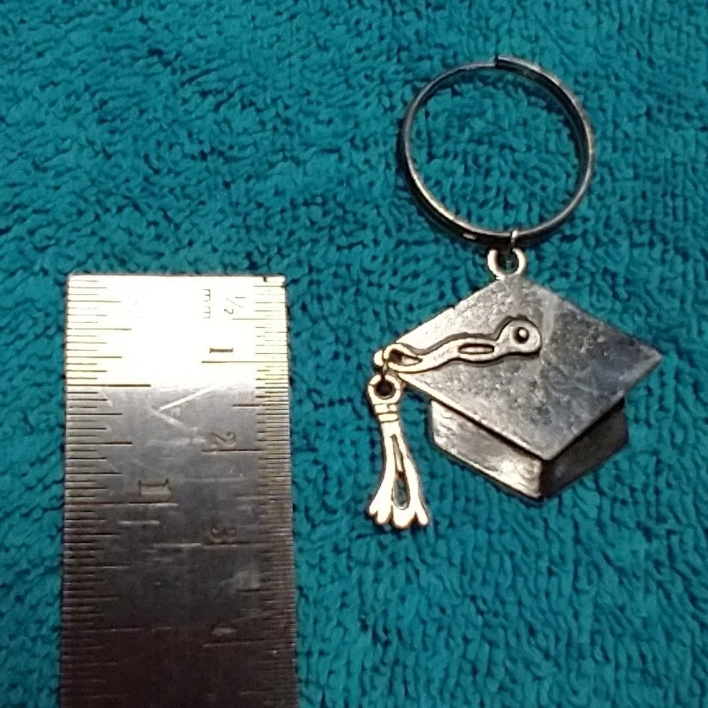 Silvertone graduation cap and tassel keychain